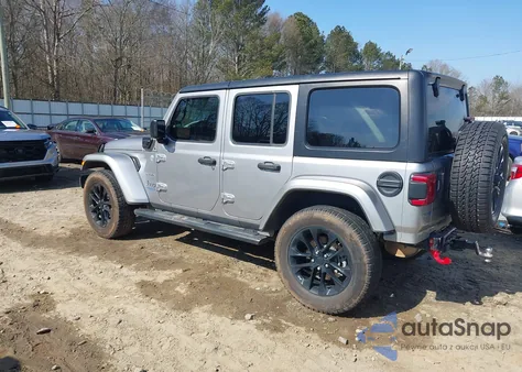 2021 Jeep Wrangler 4Xe Unlimited Sahara 4X4 z USA, uszkodzony, nr VIN 1C4JJXP63MW742836